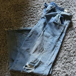 Light blue distressed denim jeans